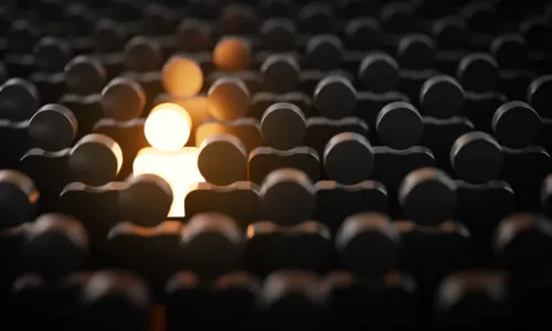 glowing among other people